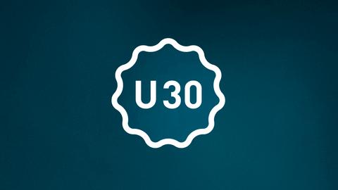 Weiße Schrift "U 30" in einem Kreis vor blauem Hintergrund